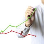 Business man hand drawing  graph